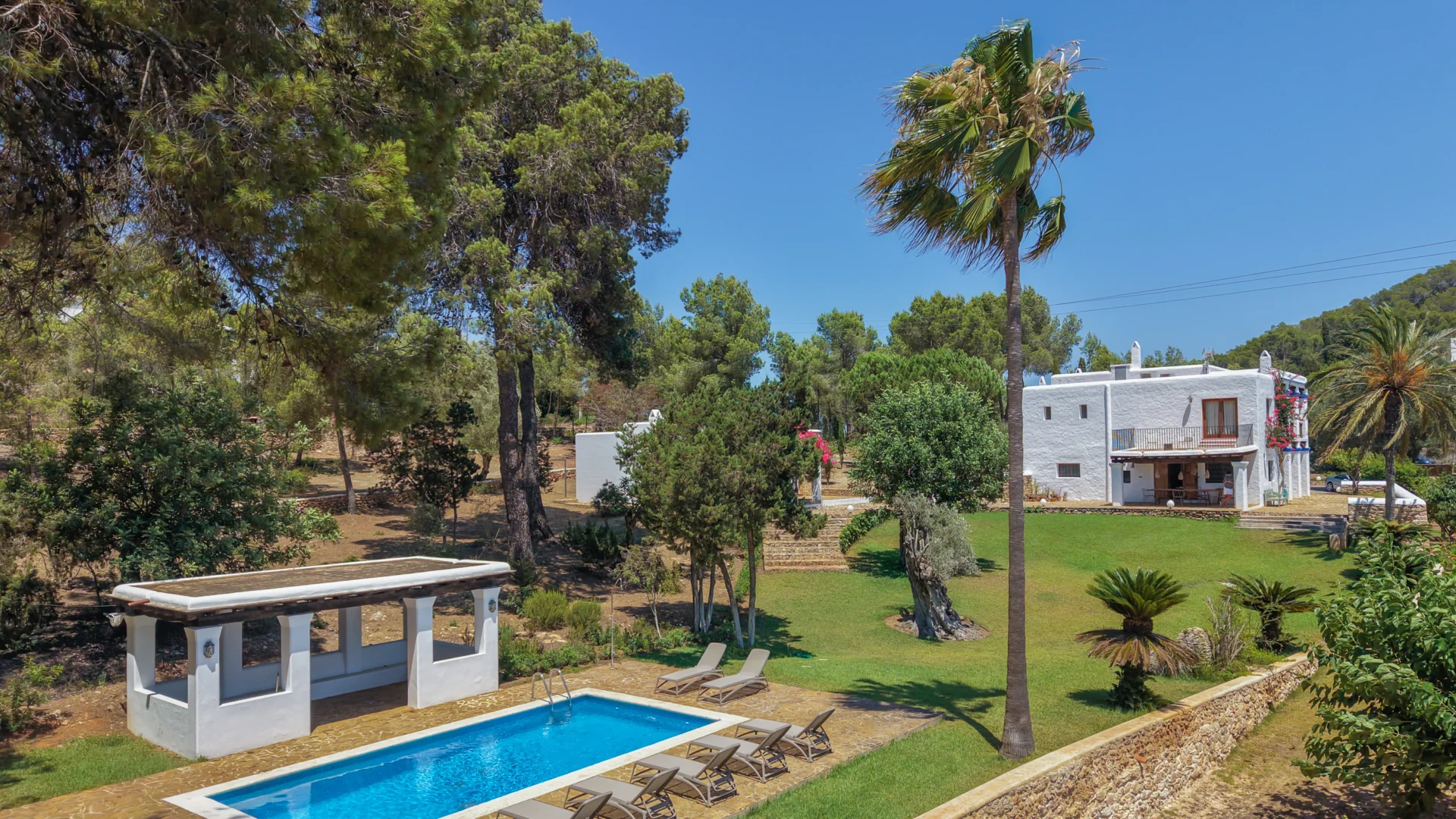 Garden with pergola, barbecue and private pool at a finca near San Carlos, Ibiza