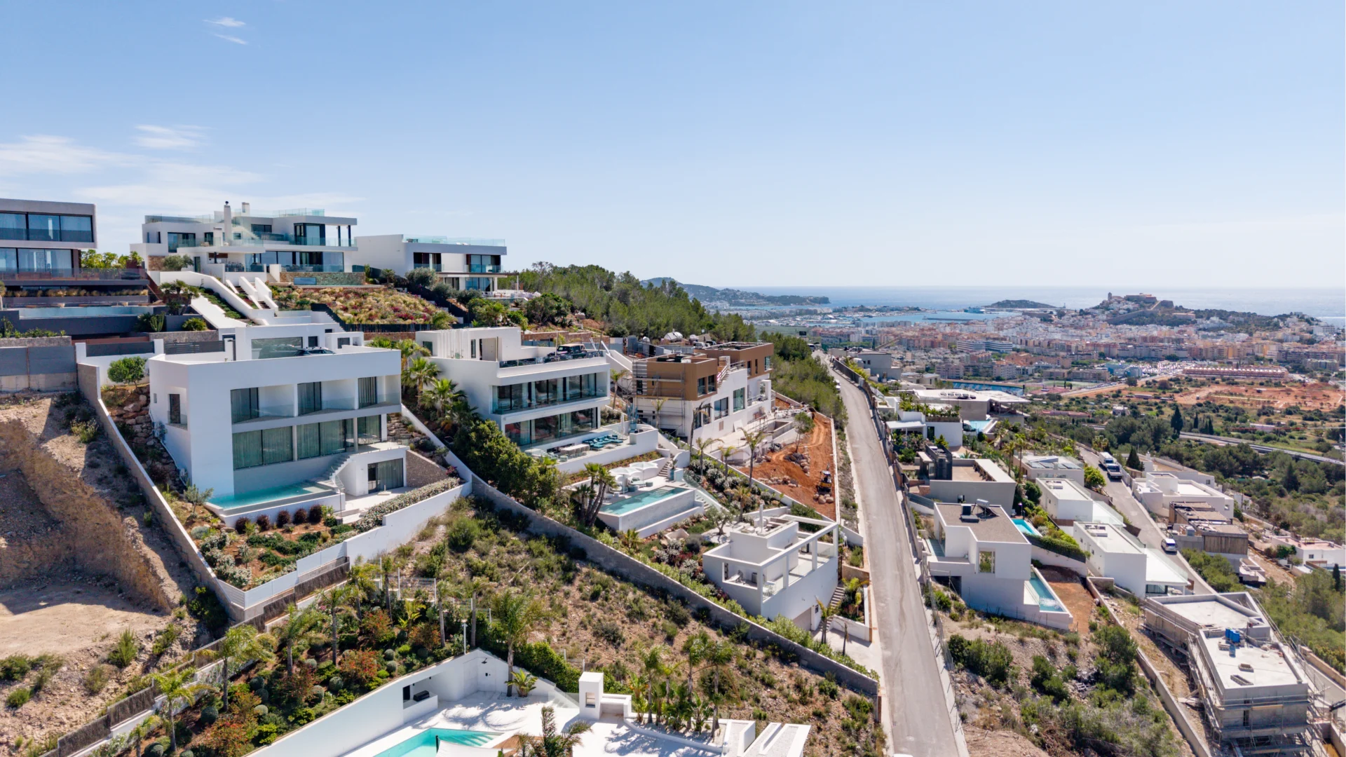 Aerial view of a villa with Ibiza Town and coast beyond in Cas Mut