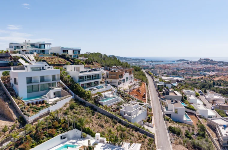 Aerial view of a villa with Ibiza Town and coast beyond in Cas Mut