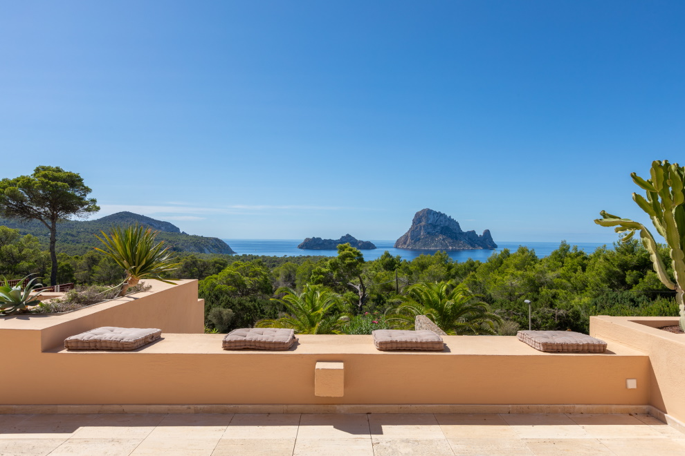 View of Es Vedrà and the coastline from the terrace in Cala Vadella, Ibiza